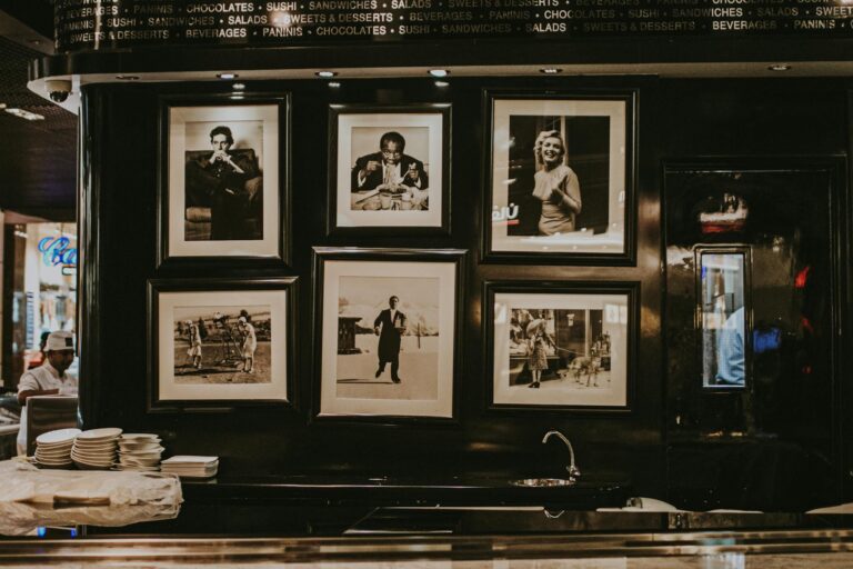 Discover a vintage photo display in a Dubai restaurant with iconic black and white prints.